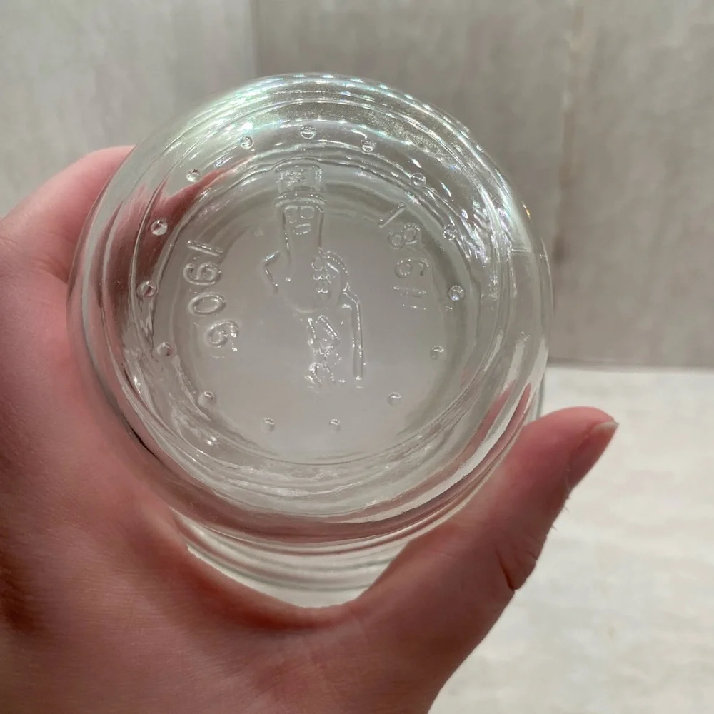 4 VINTAGE PLANTERS MR PEANUT GLASS JARS WITH LIDS (2) 1982, 1983, 1984